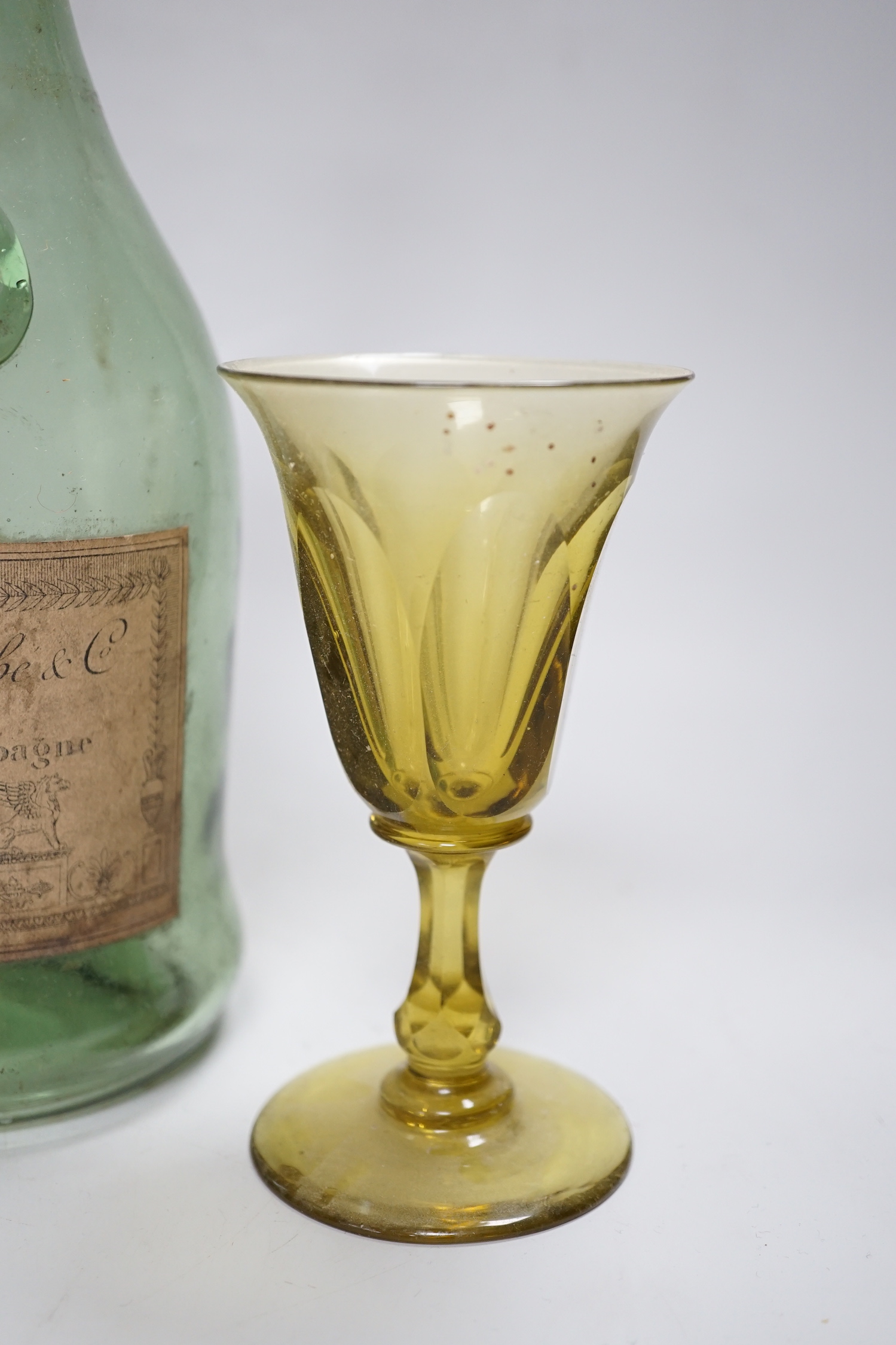 A group of green Georgian and later glass, together with a Napoleon brandy bottle